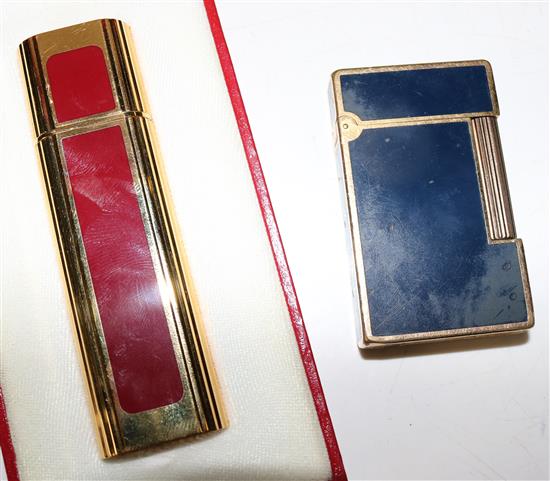 Dupont blue enamel and gilt metal pocket lighter and a Cartier perfume spray(-0